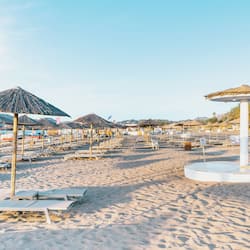 On the beach, sun loungers, beach umbrellas, beach towels