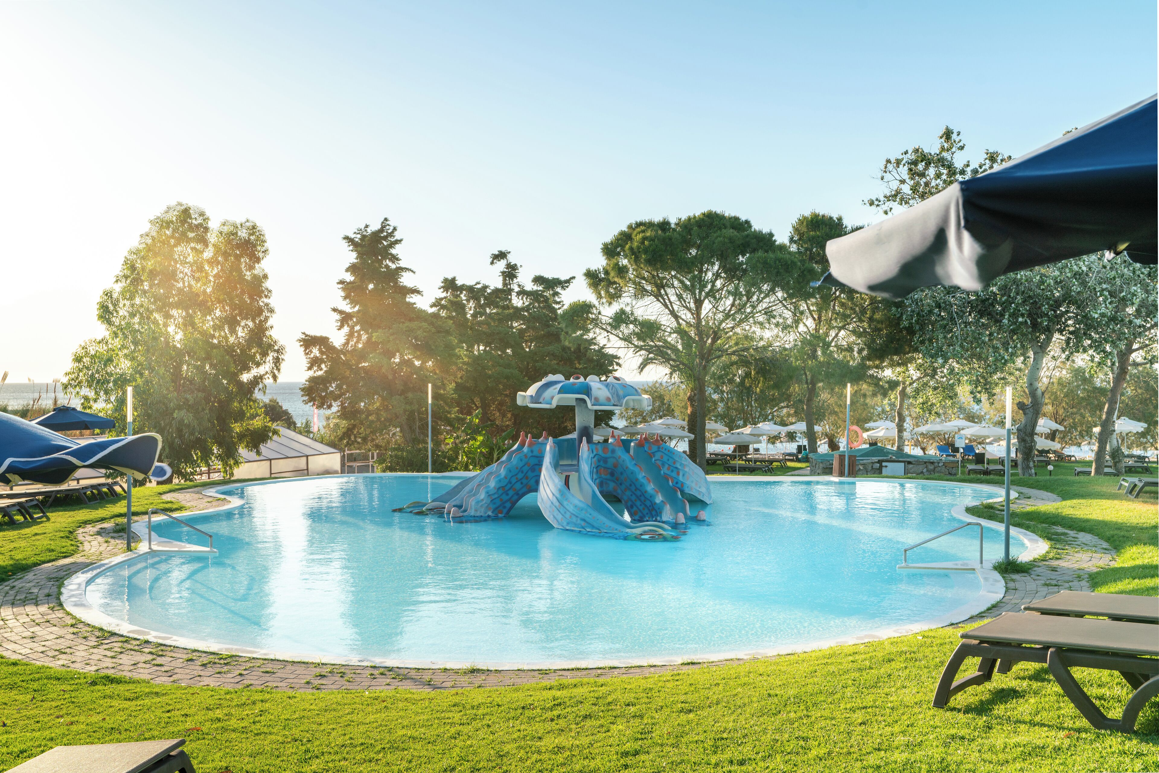 2 outdoor pools, pool umbrellas, pool loungers