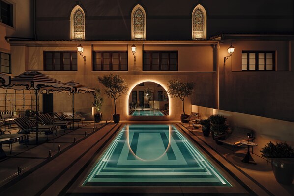 Seasonal outdoor pool, pool umbrellas, pool loungers