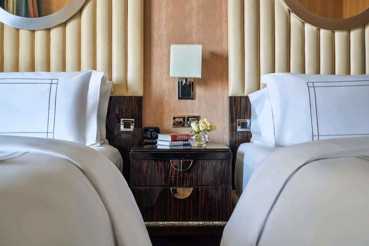 Premium bedding, down comforters, pillowtop beds, minibar