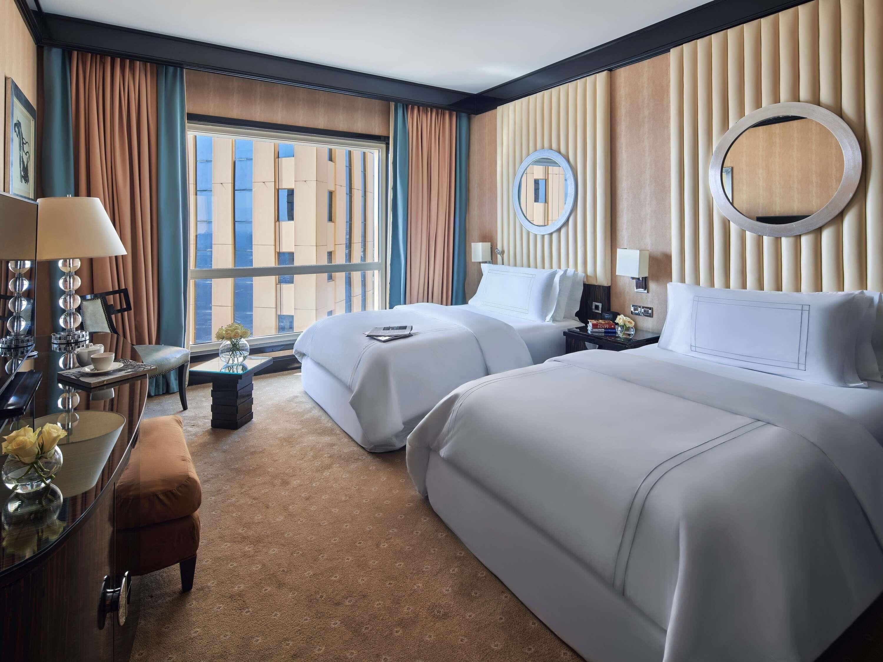 Premium bedding, down comforters, pillowtop beds, minibar