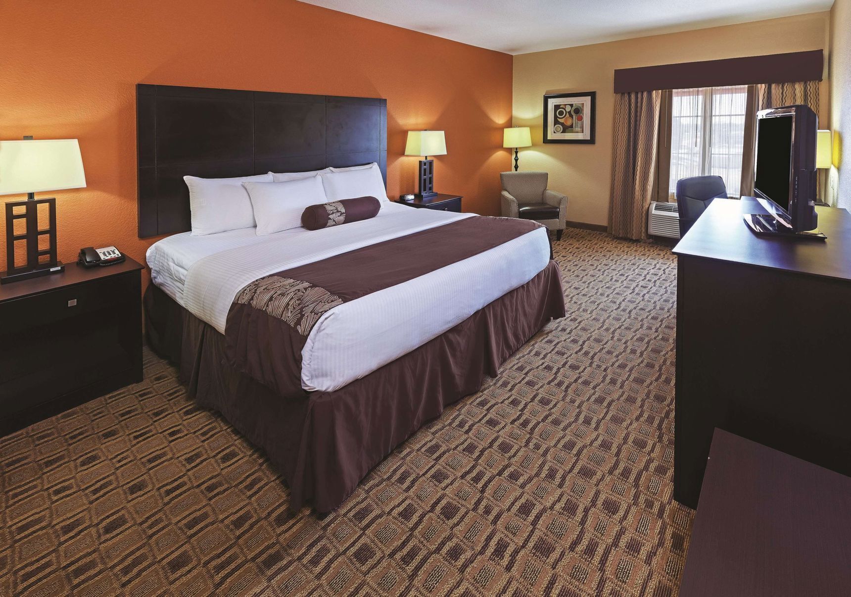 Premium bedding, desk, laptop workspace, soundproofing