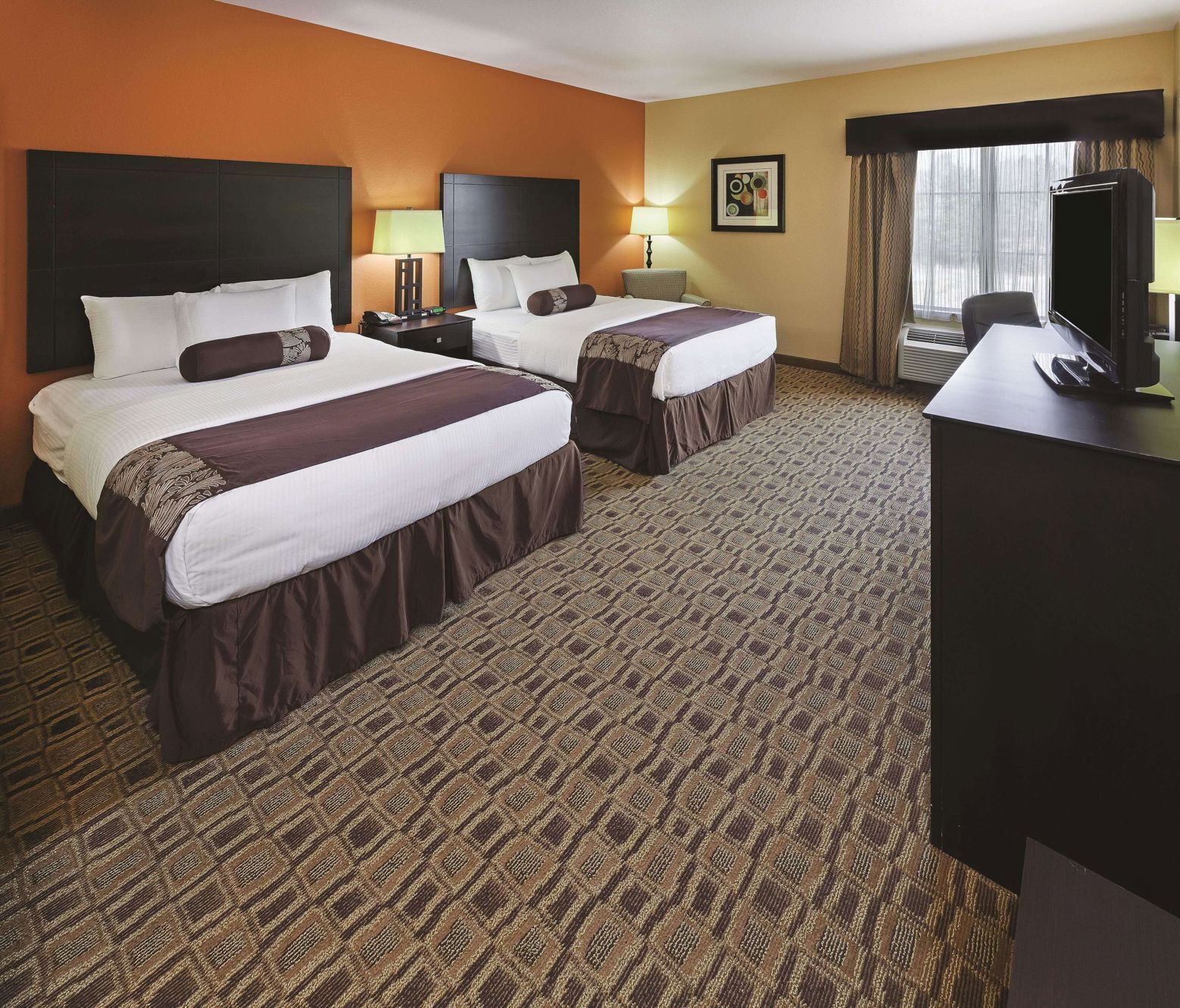 Premium bedding, desk, laptop workspace, soundproofing