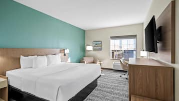 Premium bedding, desk, laptop workspace, soundproofing