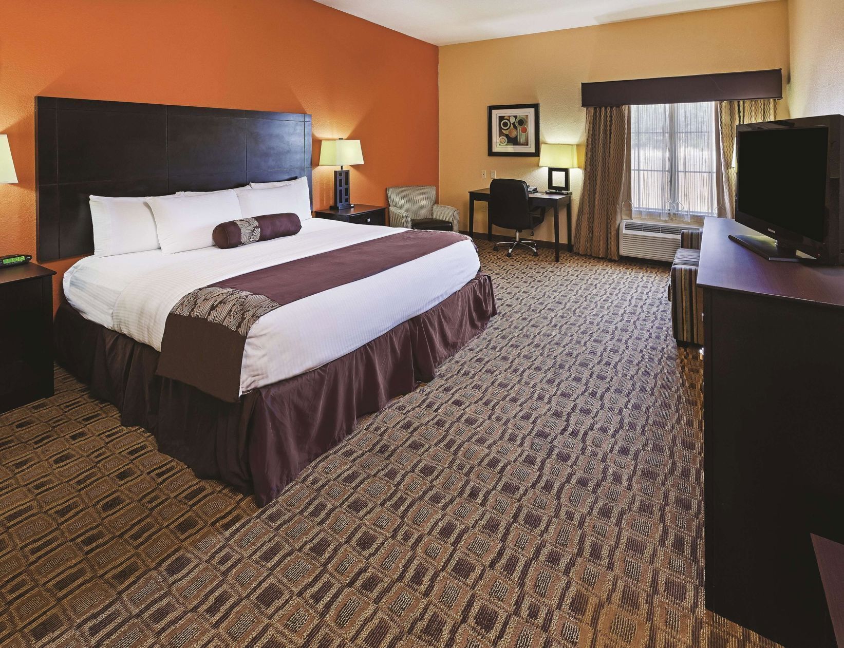 Premium bedding, desk, laptop workspace, soundproofing