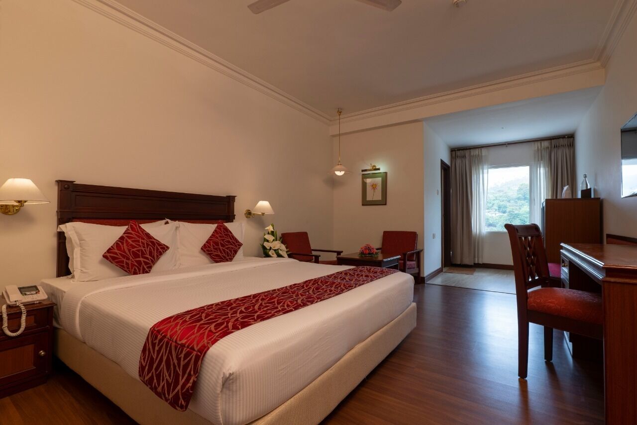 Premium Room, 1 Double Bed, Mountain View | Minibar, in-room safe, desk, laptop workspace