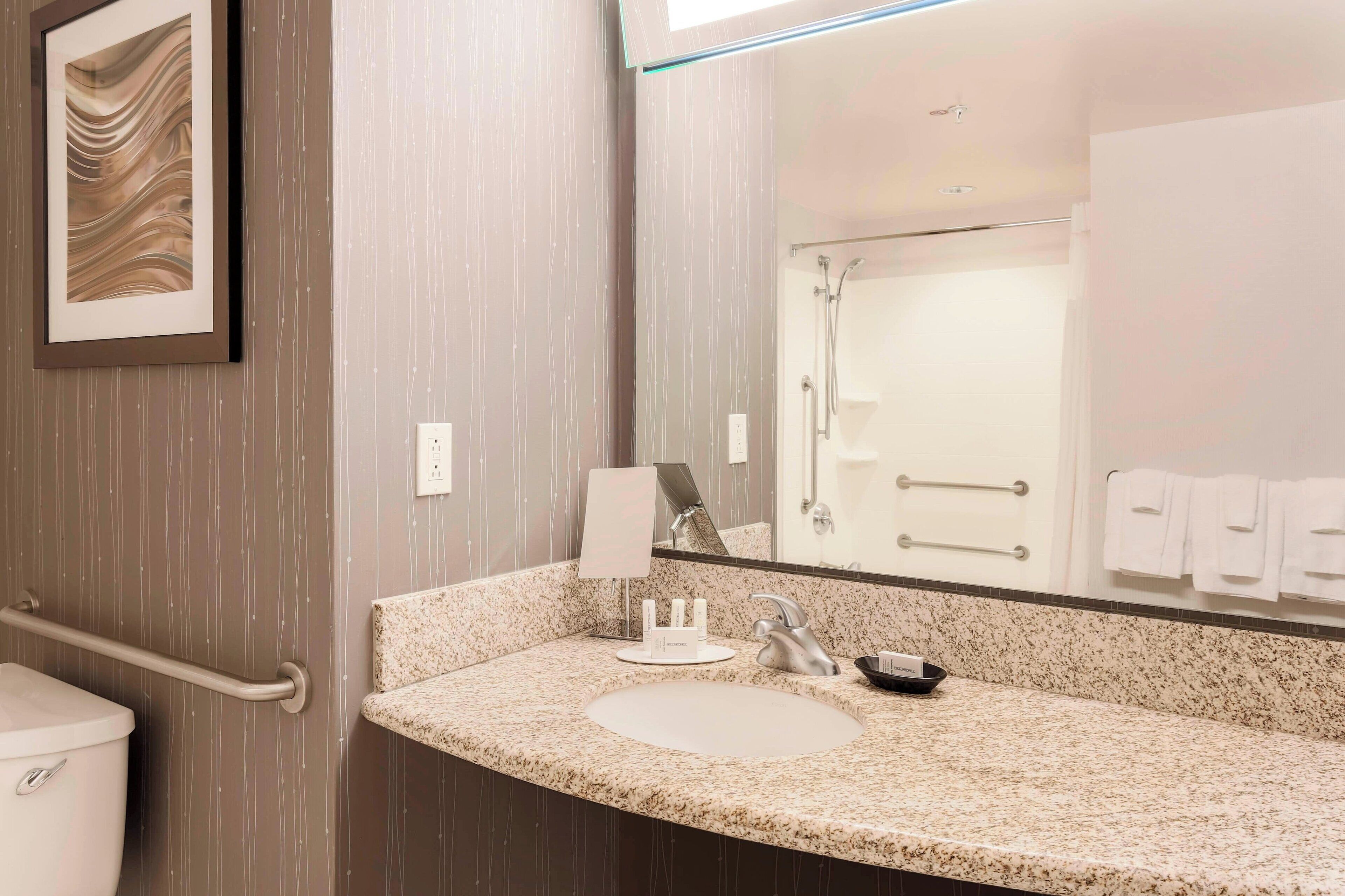 suite, multiple beds | bathroom | shower, free toiletries, hair dryer, towels