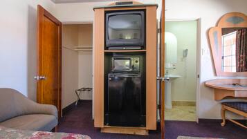 Standard Double Room, 1 Bedroom | Living area | 32-inch flat-screen TV with satellite channels, TV