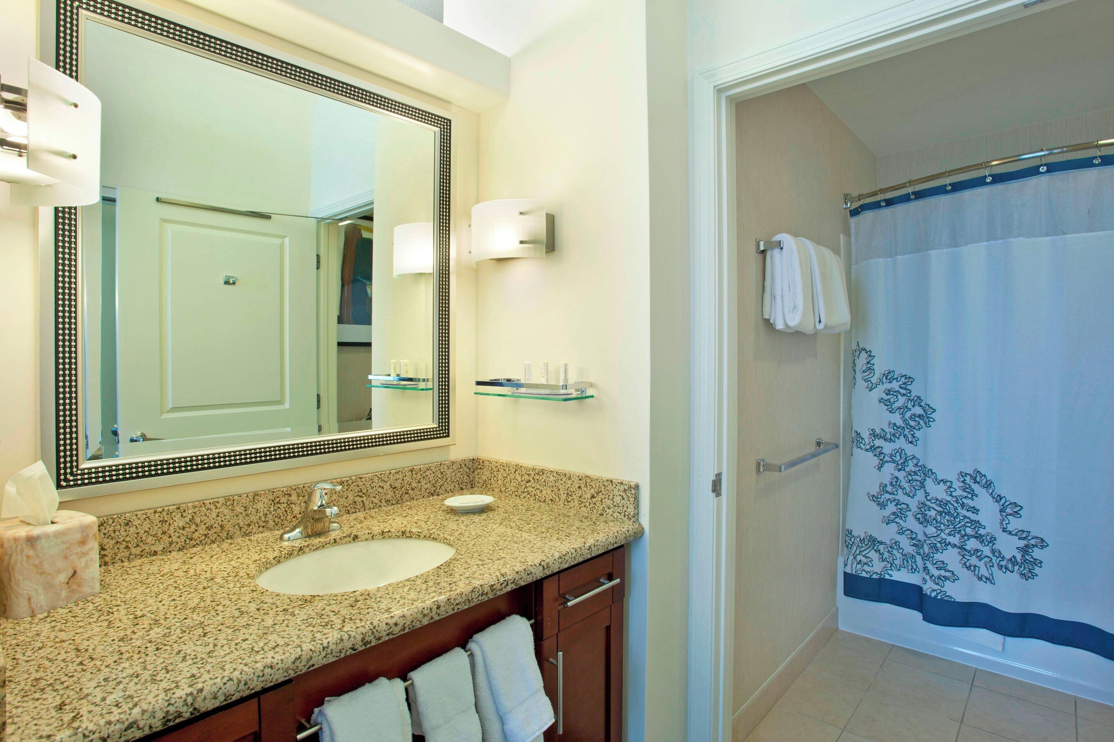 combined shower/bathtub, free toiletries, hair dryer, towels