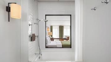 Designer toiletries, hair dryer, bathrobes, slippers