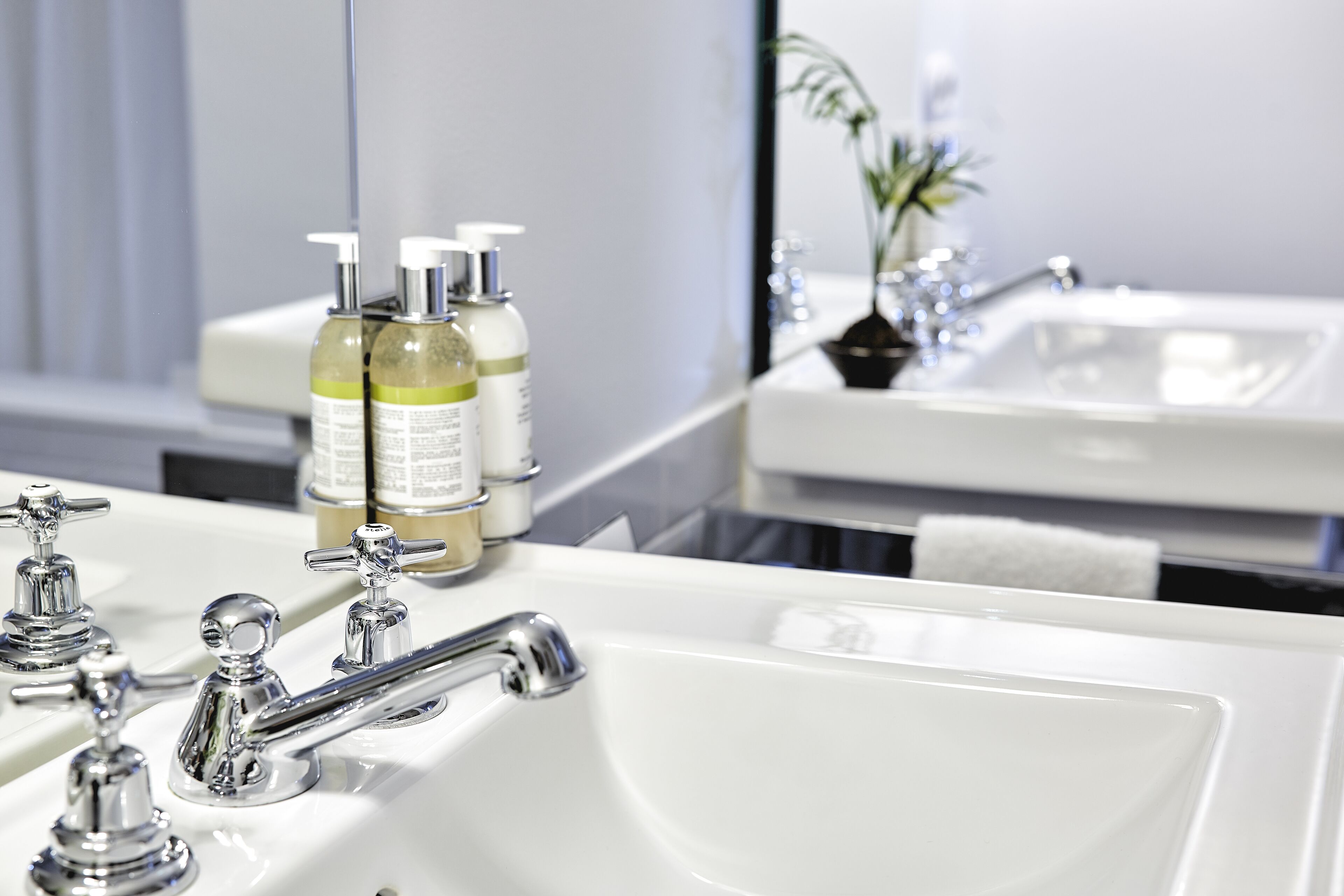 louis suite | bathroom | designer toiletries, hair dryer, bathrobes, slippers