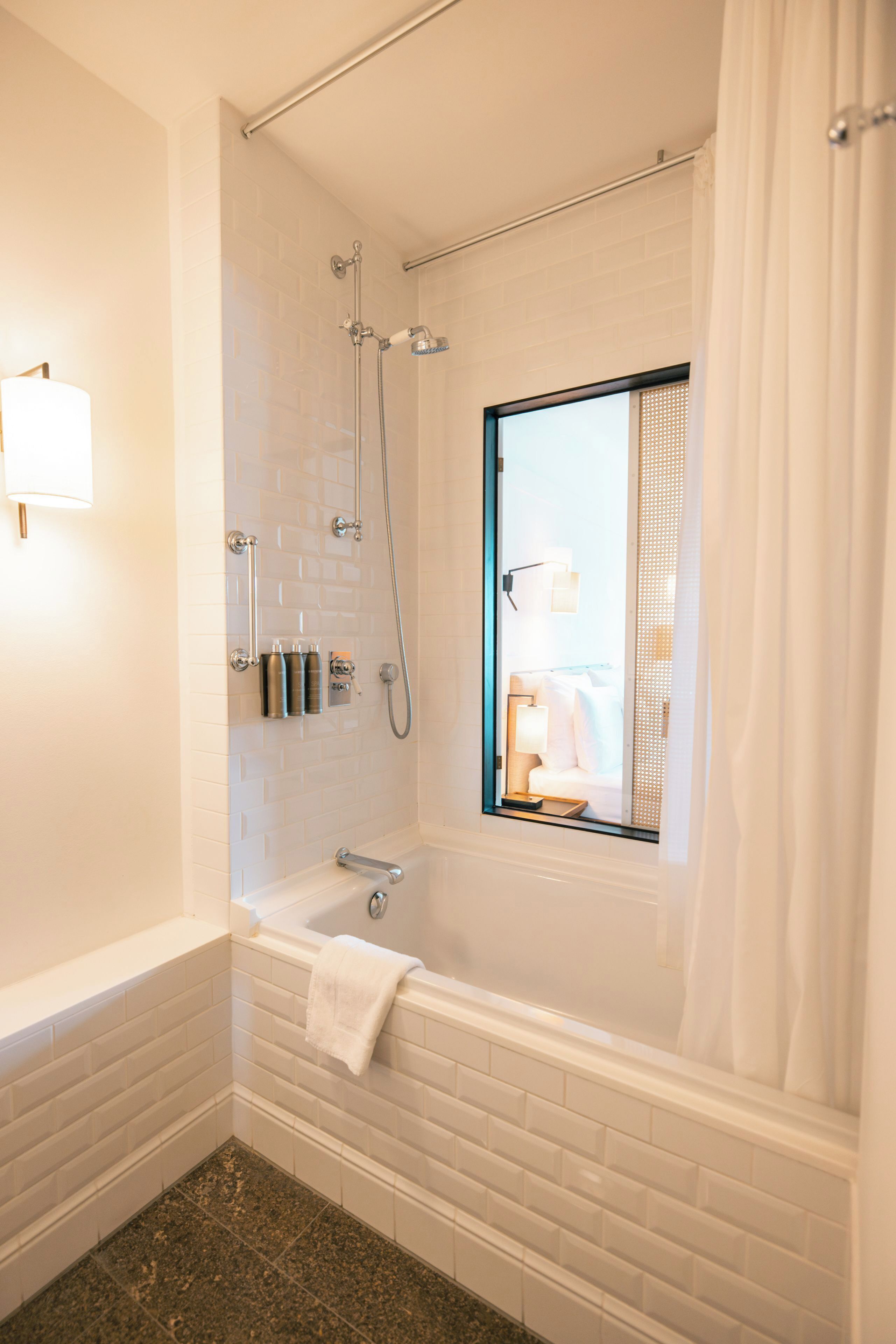 designer toiletries, hair dryer, bathrobes, slippers