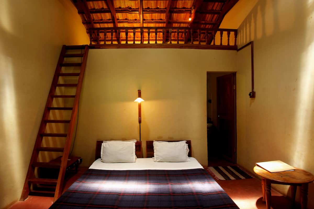 Economy Double Room, 1 Double Bed, Courtyard View | 2 bedrooms, desk, bed sheets