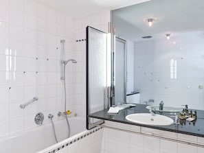 Bathtub, free toiletries, hair dryer, bathrobes