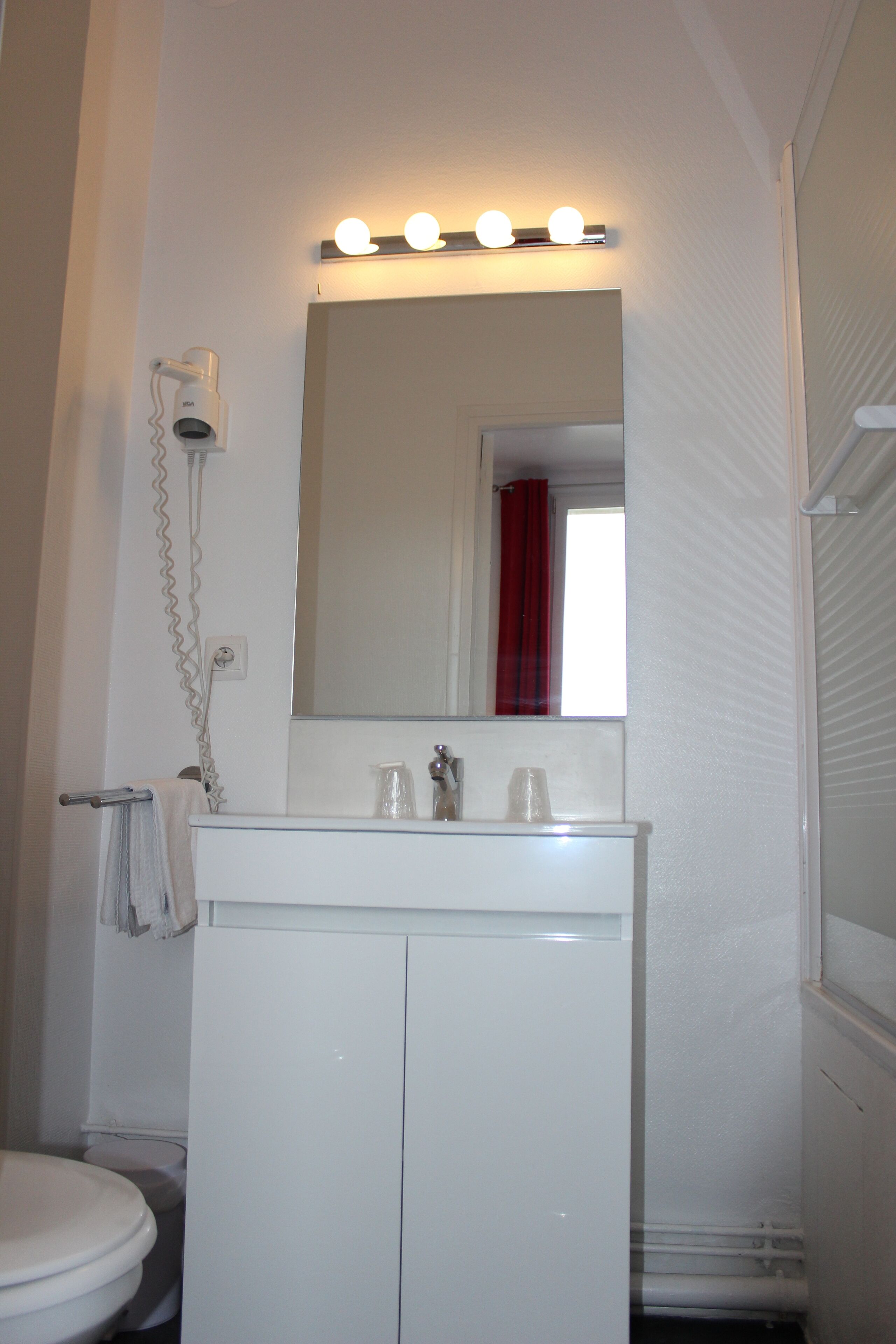 eco-friendly toiletries, hair dryer, towels, soap