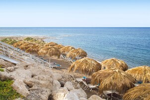 Sun loungers, beach umbrellas, beach towels, beach bar
