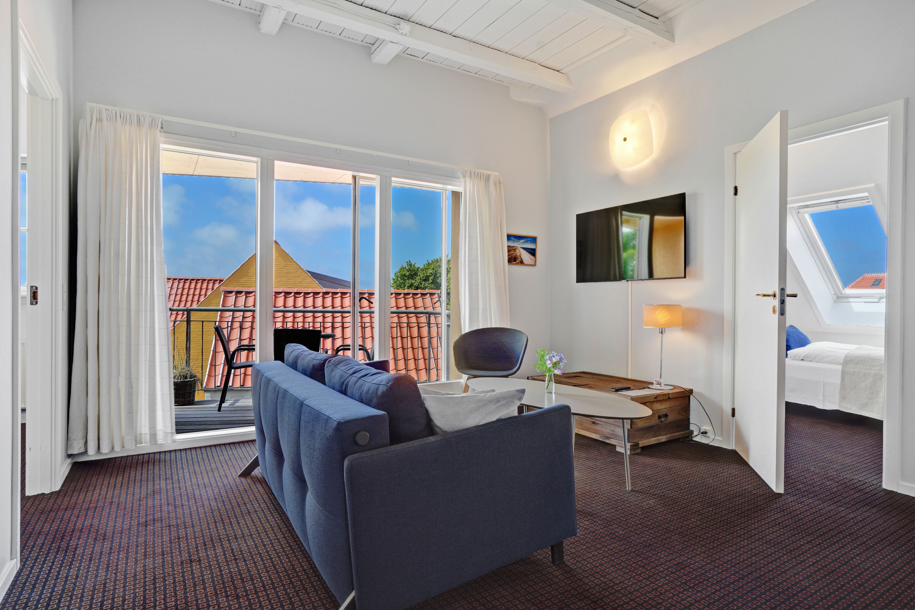 Suite, 1 soverom, kjøkken | Oppholdsområde | Bøker