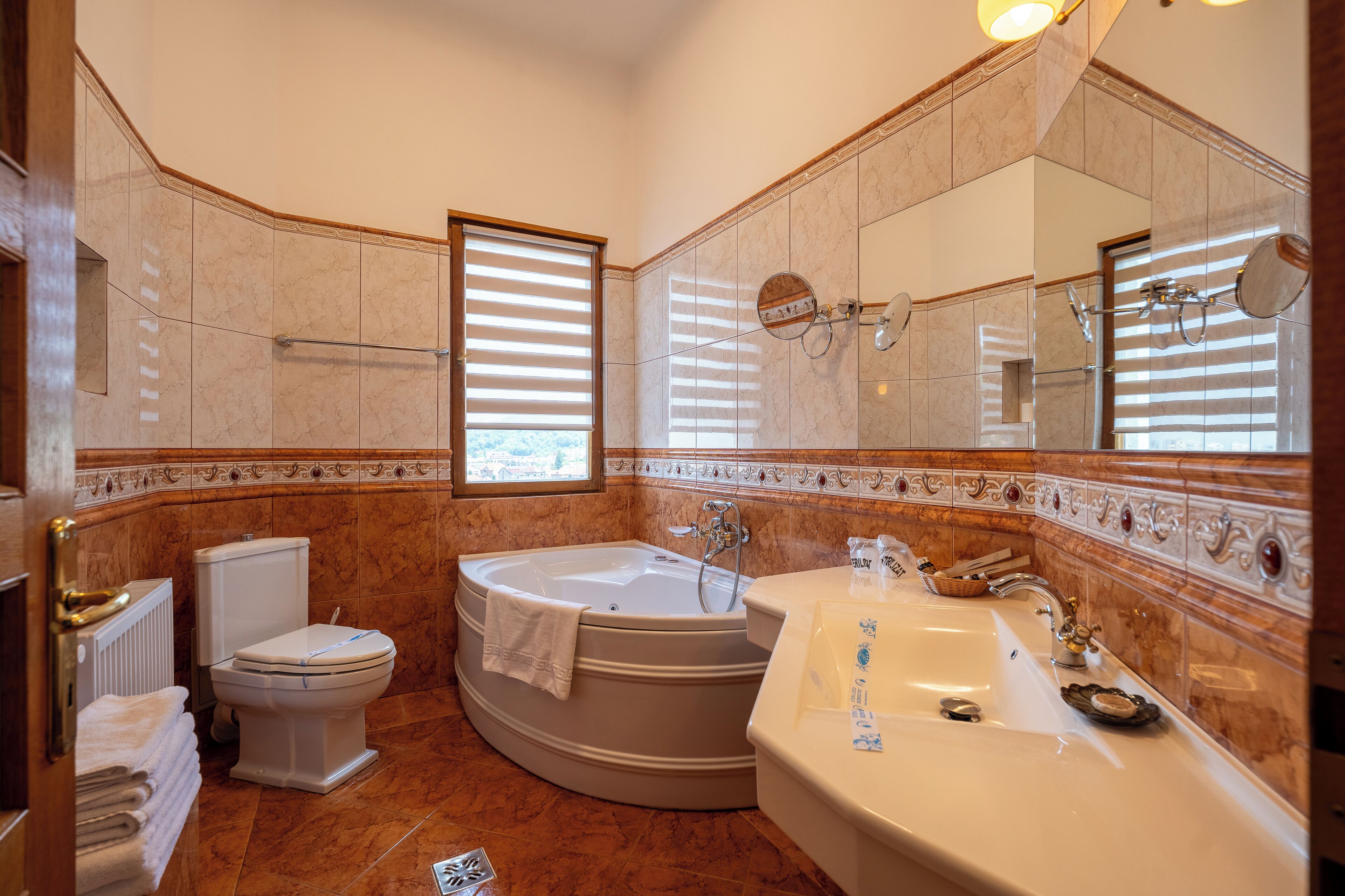 luxury apartment, 1 king bed with sofa bed, mountain view | bathroom | free toiletries, hair dryer, bathrobes, slippers