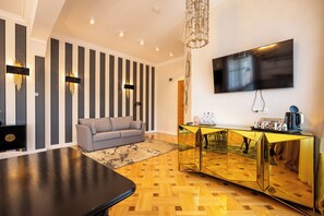 Luxury Apartment, 1 King Bed with Sofa bed, Mountain View | Living area | TV