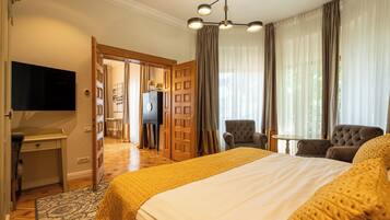 Literie hypoallergénique, minibar, fer et planche à repasser