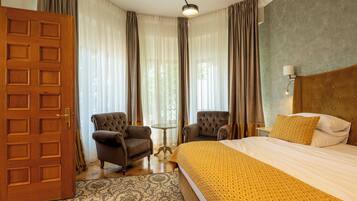 Apartamento superluxo, 1 cama King e sofá-cama, vista para a montanha | Roupas de cama antialérgicas, frigobar, ferros/tábuas de passar roupa