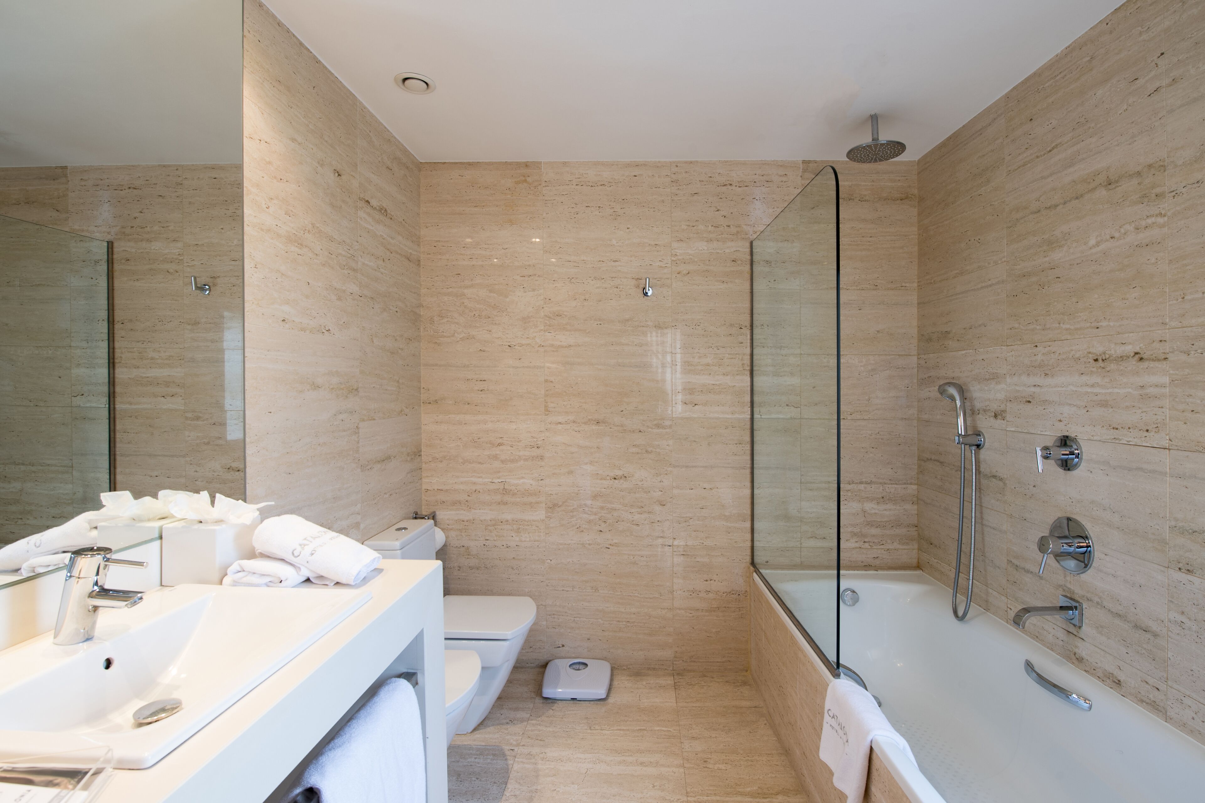 eco-friendly toiletries, hair dryer, towels