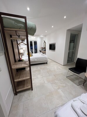 Deluxe Studio Suite, Sea View | Down comforters, minibar, desk, free WiFi