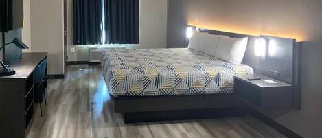 Premium bedding, pillowtop beds, desk, laptop workspace