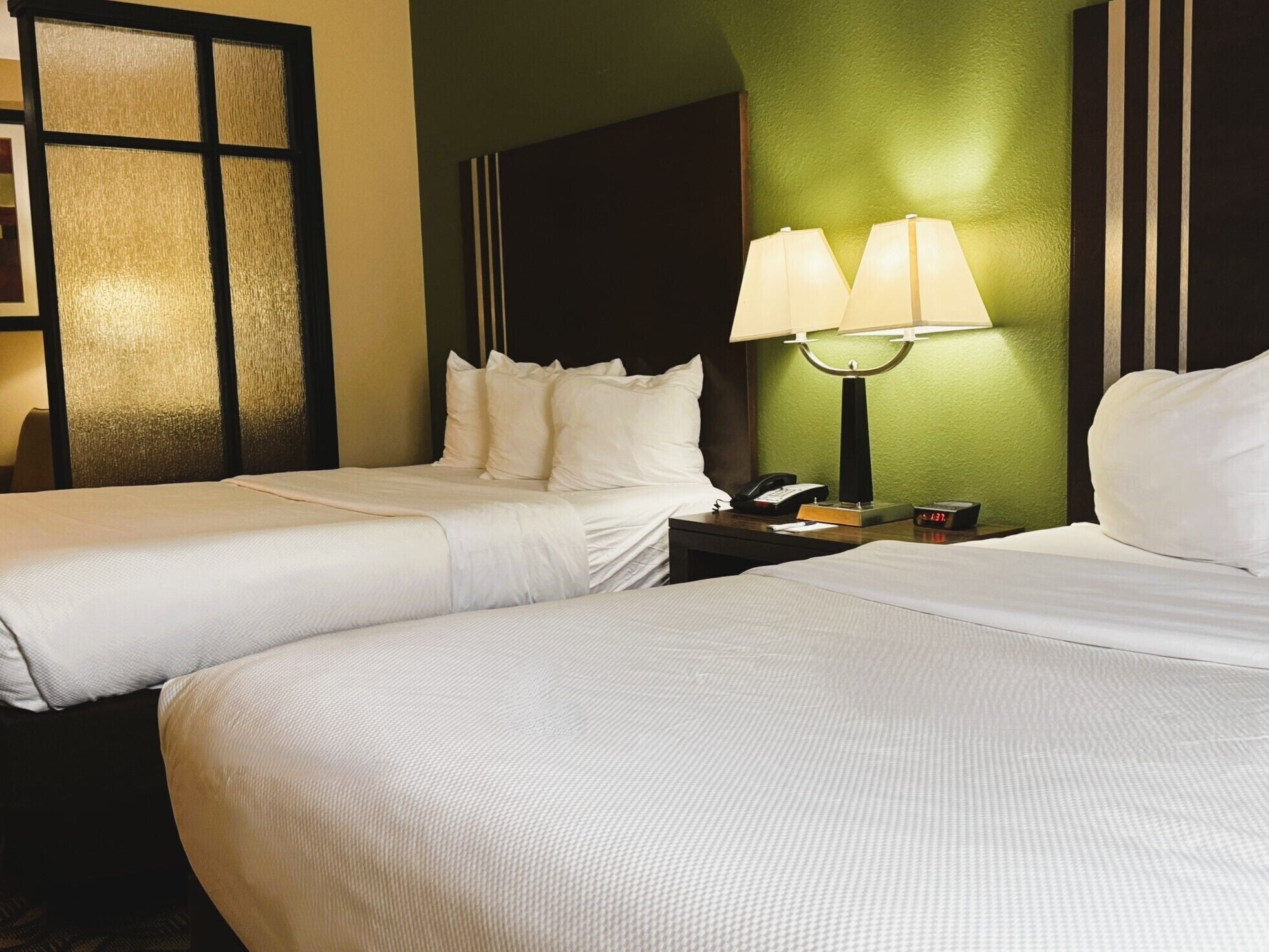 Premium bedding, Select Comfort beds, individually furnished, desk