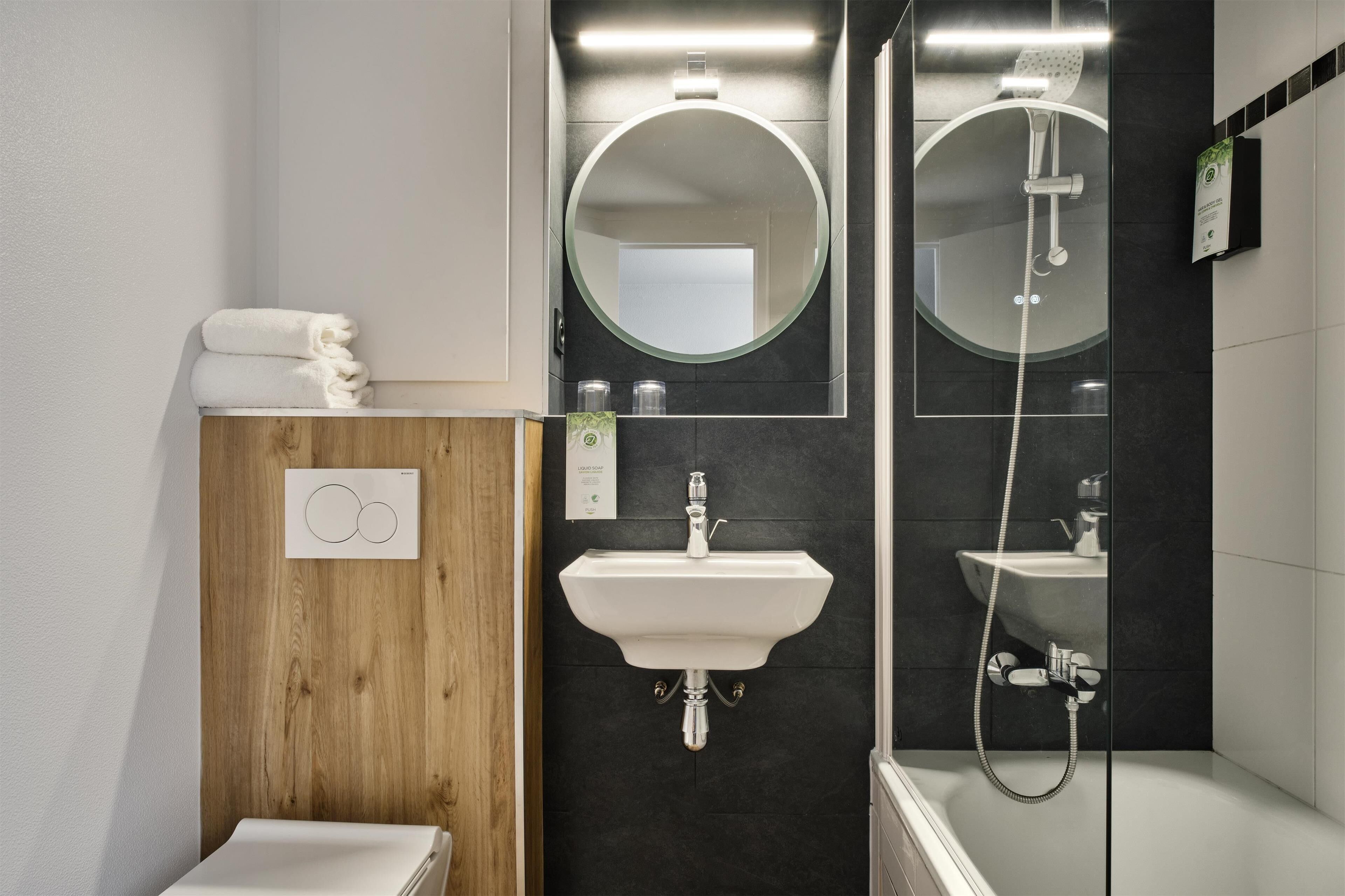 eco-friendly toiletries, hair dryer, towels, soap