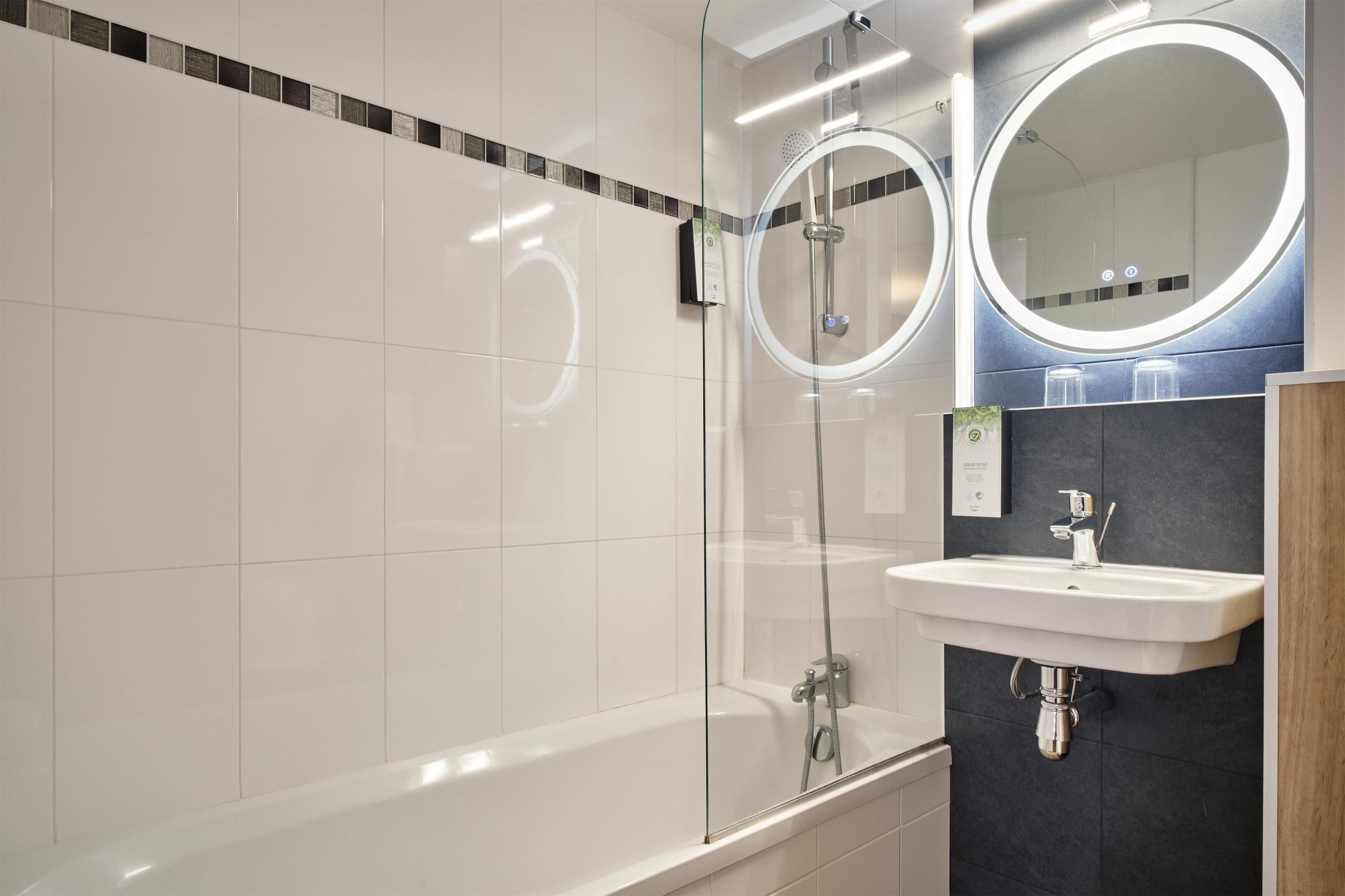 eco-friendly toiletries, hair dryer, towels, soap