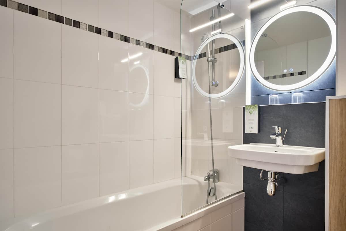 eco-friendly toiletries, hair dryer, towels, soap