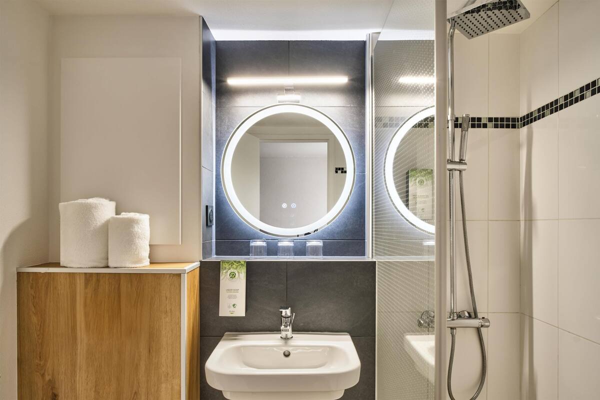 eco-friendly toiletries, hair dryer, towels, soap