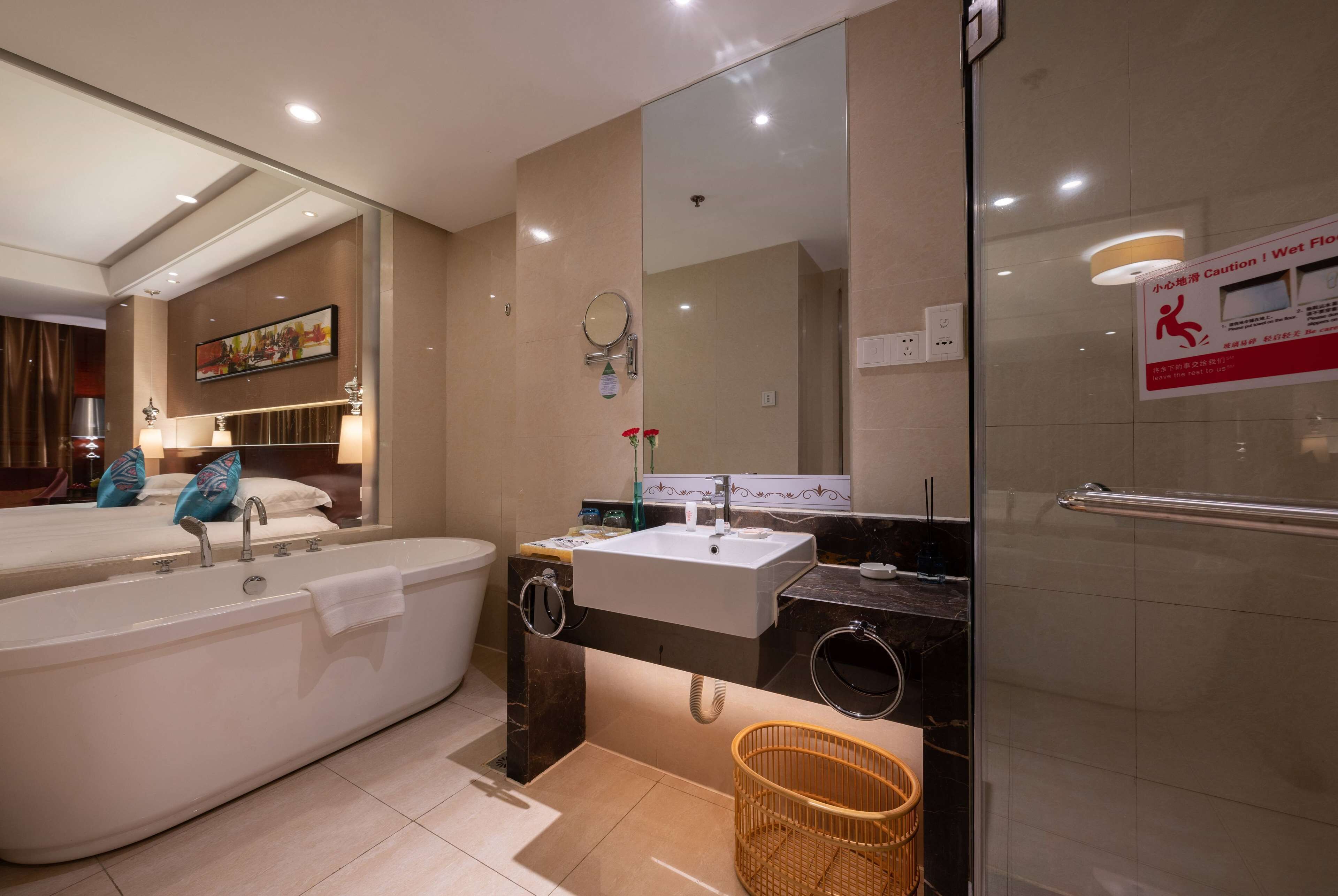 Separate tub and shower, free toiletries, hair dryer, bathrobes
