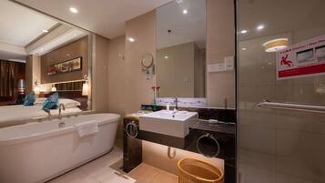 Separate tub and shower, free toiletries, hair dryer, bathrobes