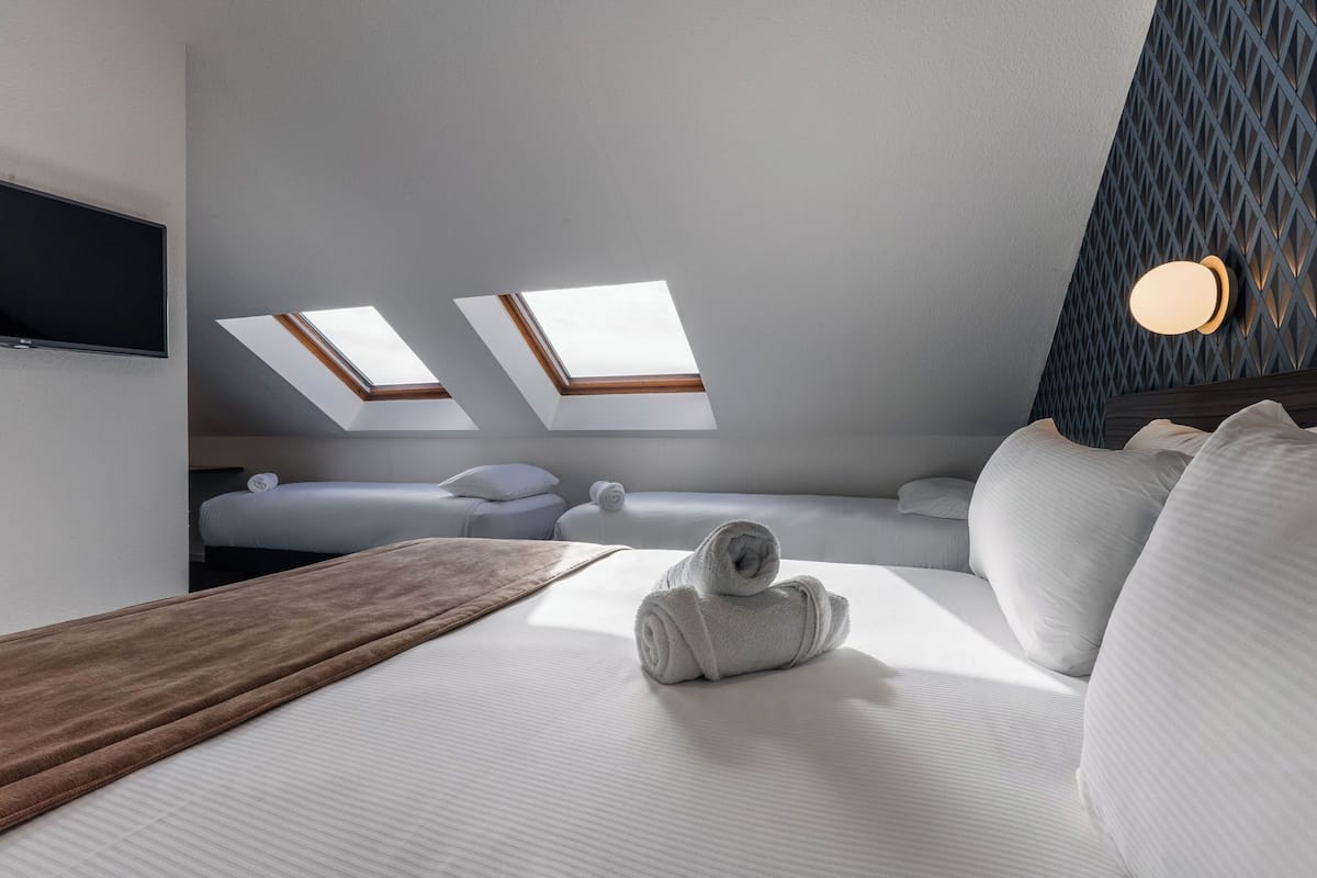 standard room, multiple beds | pillow-top beds, individually decorated, individually furnished, desk