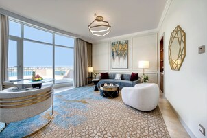 Suite, 1 King Bed, Sea View | Living area | TV