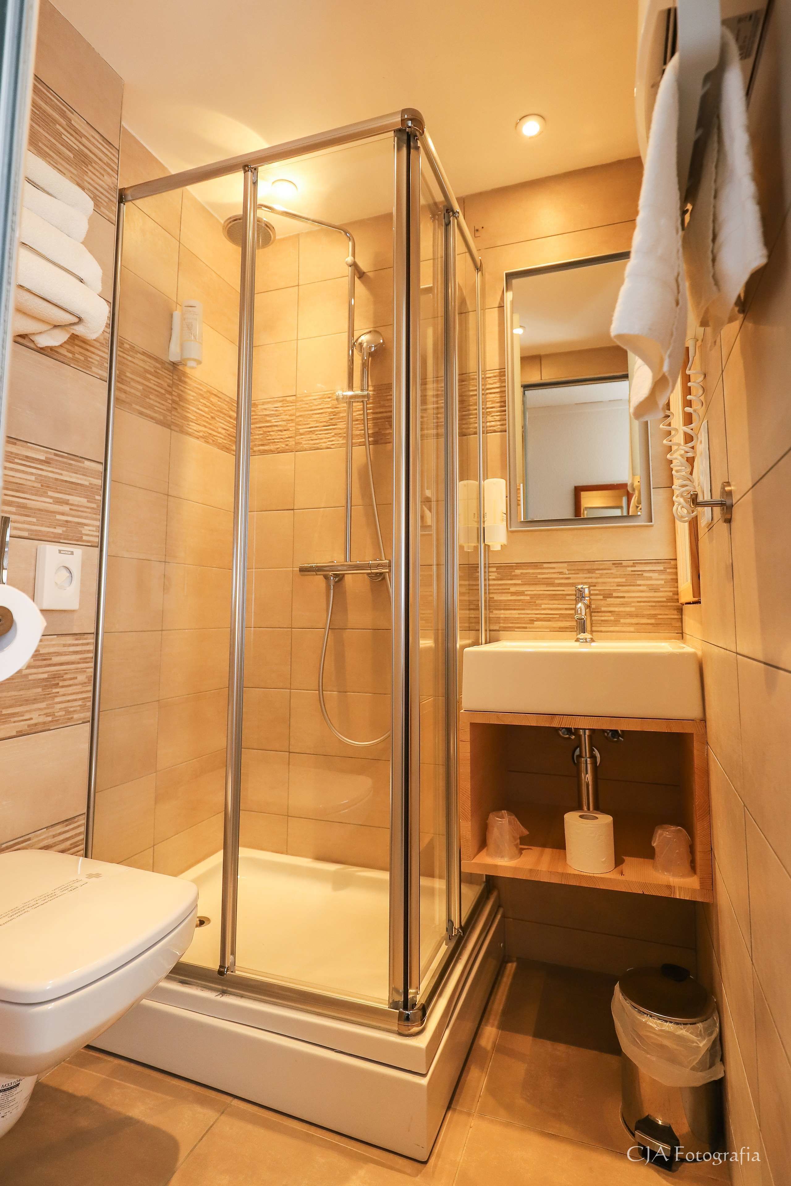 Shower, eco-friendly toiletries, hair dryer, towels