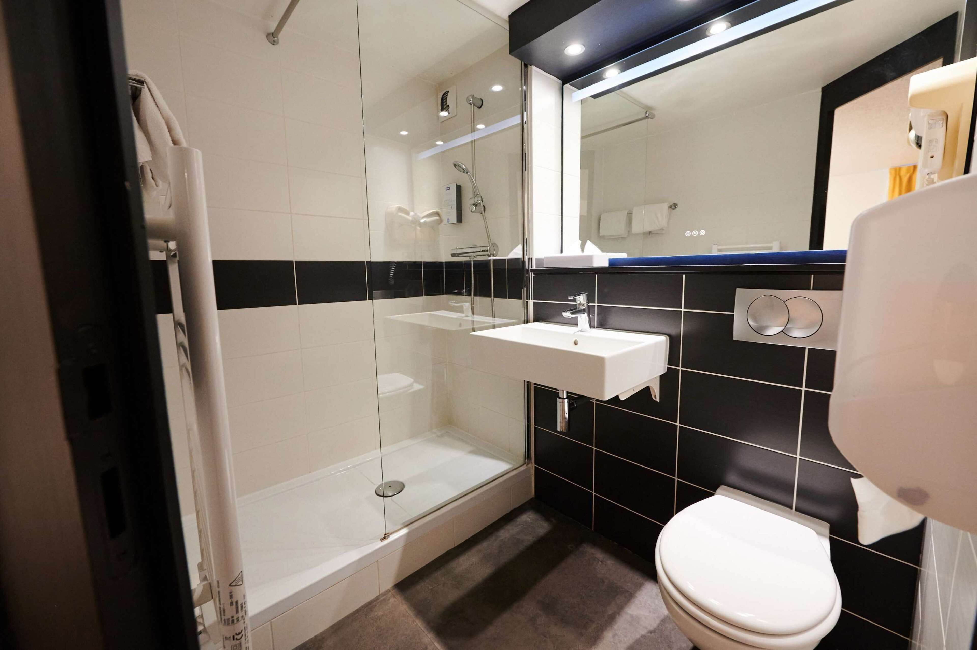 shower, eco-friendly toiletries, hair dryer, bidet