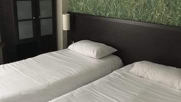 Desk, laptop workspace, blackout curtains, free WiFi