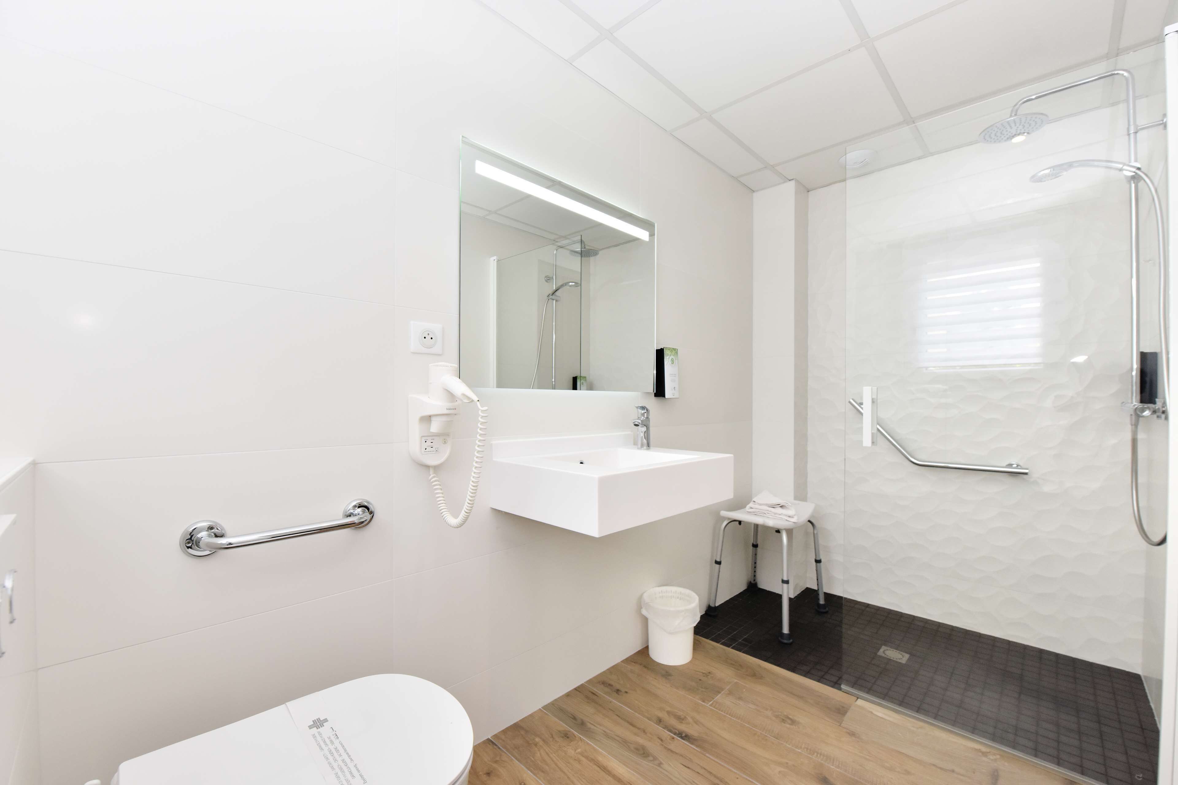 eco-friendly toiletries, hair dryer, towels