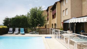 Outdoor pool, open 8:00 AM to 7:00 PM, sun loungers