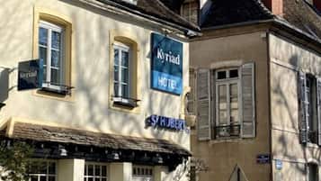 Experience the charm of a traditional European-style hotel with a classic facade and welcoming atmosphere.