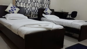 Premium bedding, blackout curtains, rollaway beds, free WiFi