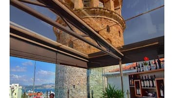 Breakfast, lunch served; international cuisine, al fresco dining