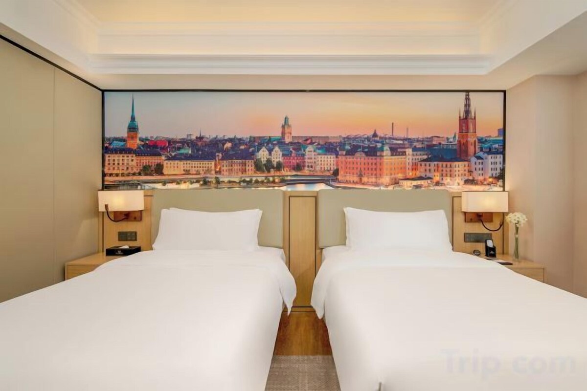Ropa de cama de alta calidad y minibar 