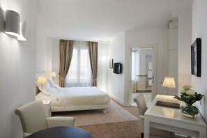 Premium bedding, down duvets, in-room safe, desk