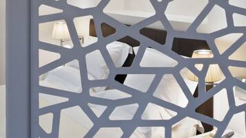 Premium bedding, down duvets, minibar, in-room safe