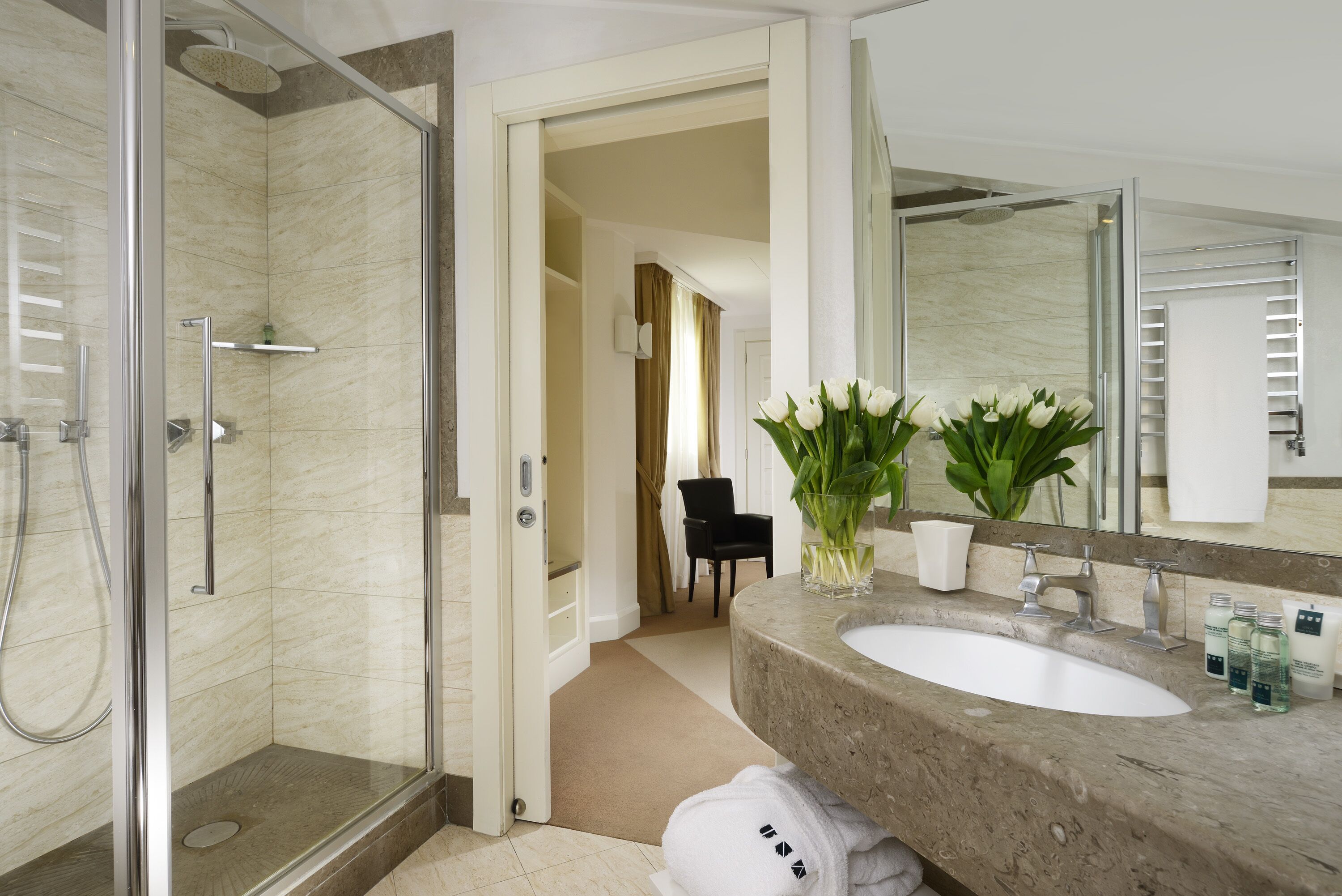 combined shower/bathtub, free toiletries, hair dryer, bathrobes