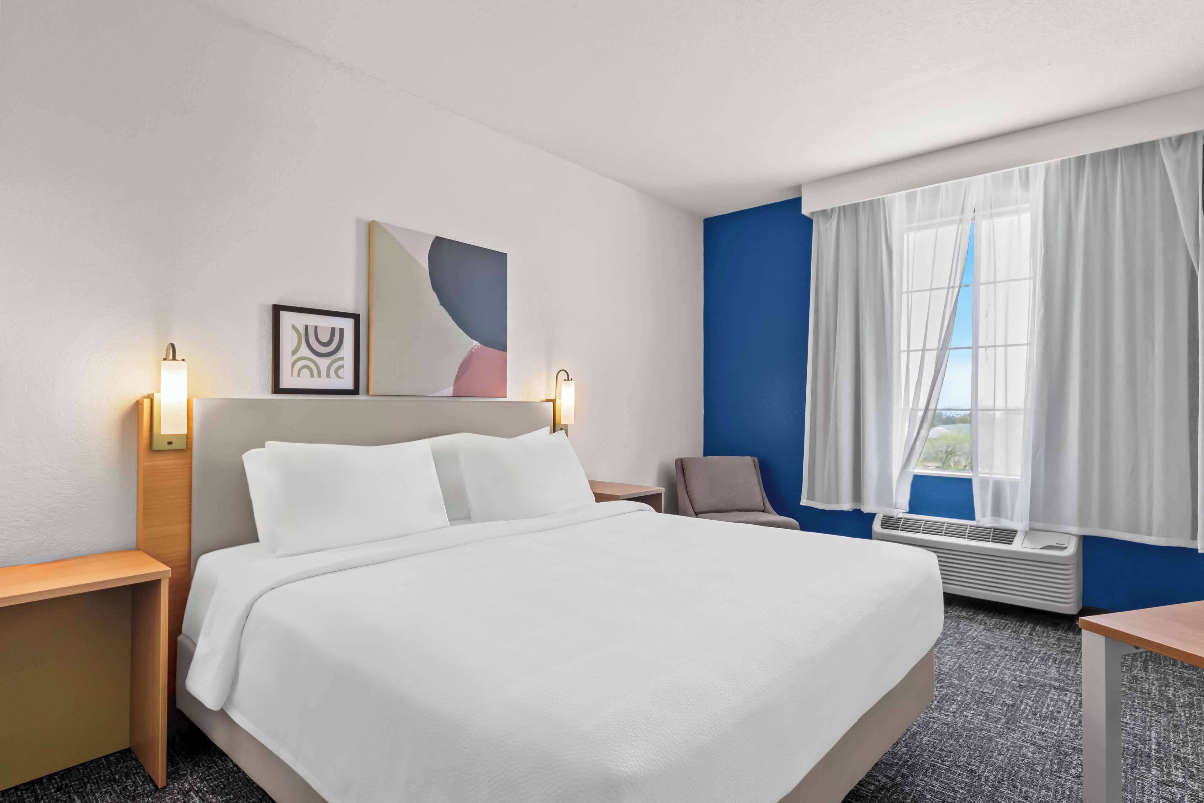 Premium bedding, pillowtop beds, desk, laptop workspace